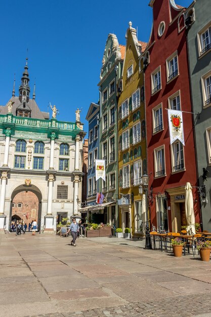 Buildings in town against clear sky