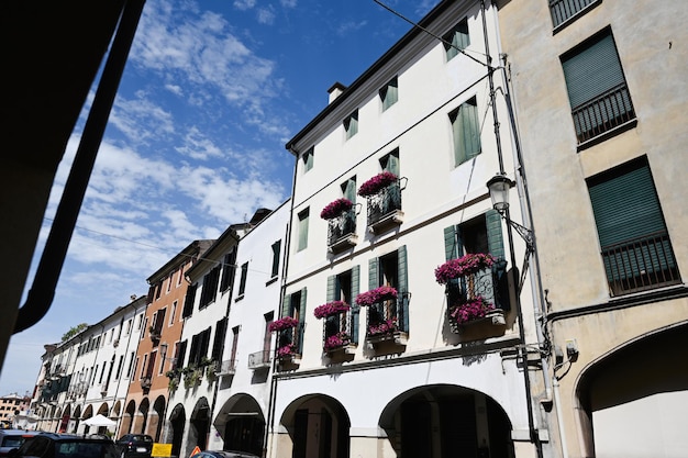 Buildings with windows and flowers in pots of Padua Veneto Italy