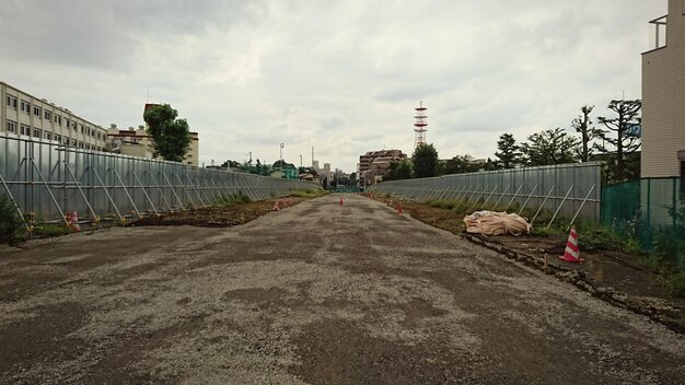 Photo built structure against cloudy sky