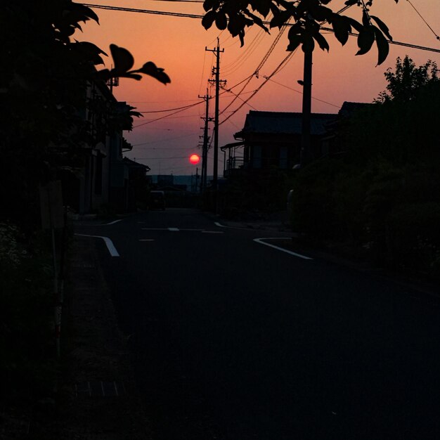 Built structure against sky at sunset