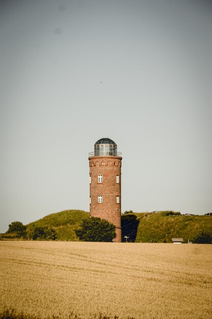 Photo built structure on field against clear sky