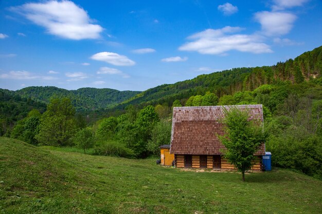 Built structure on field against sky