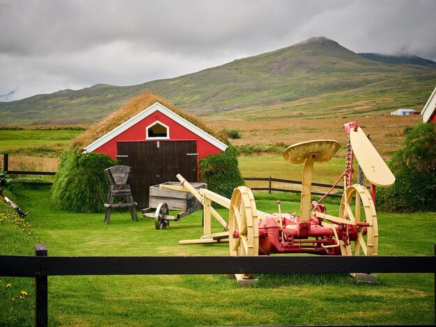 Built structure on field against sky