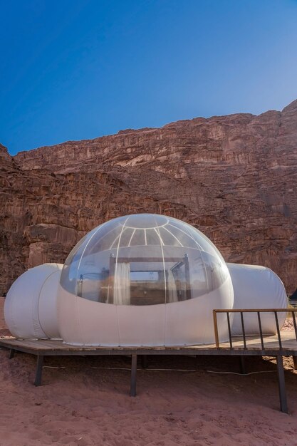 Built structure on mountain against clear blue sky