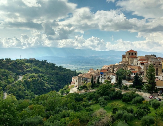 Photo built structures on countryside landscape