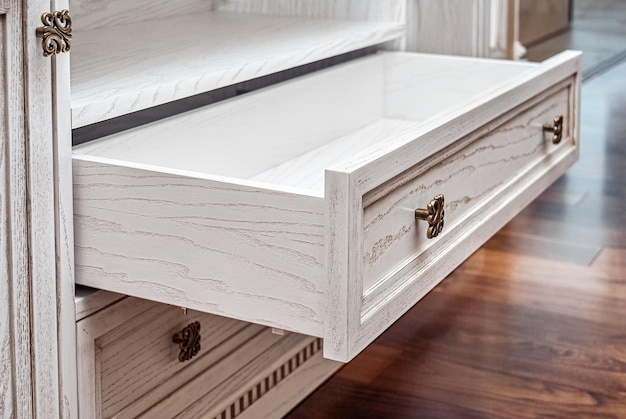 Builtin chest of drawers from veneer and solid ash in light enamel with gray patina