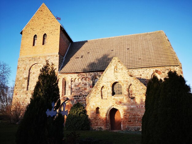 Foto buitenkant van historisch gebouw tegen een heldere lucht