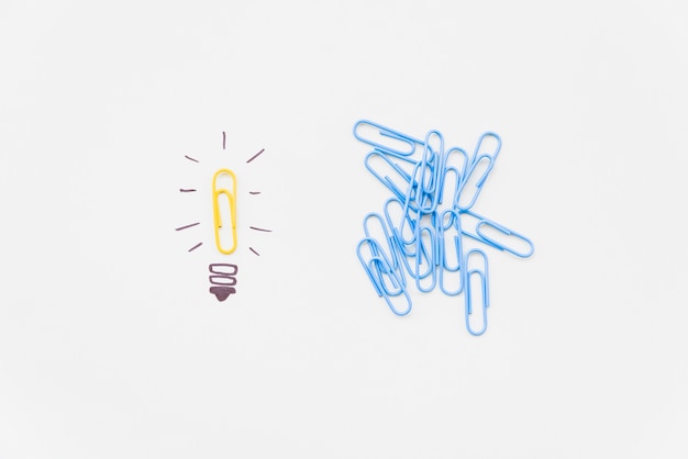 Bulb drawing with yellow paperclip as light