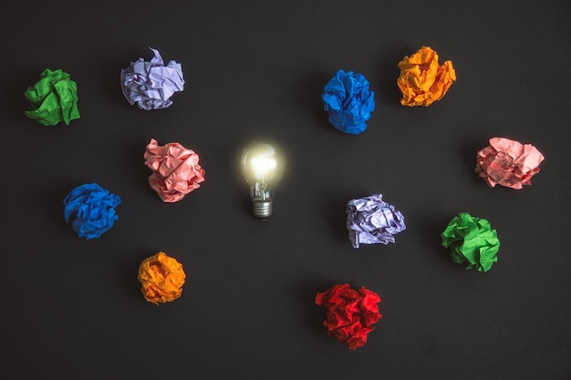 Bulb with papers on desk