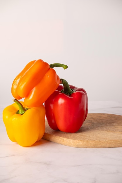 Bulgarian pepper of different colors on a white background
