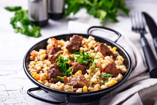 Bulgur with meat and vegetables