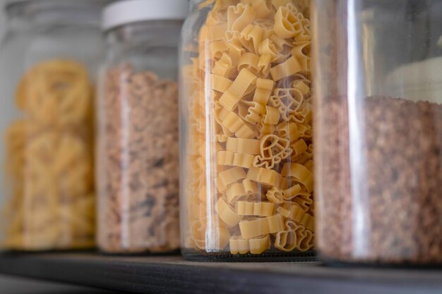 Bulk food in glass jars on shelf