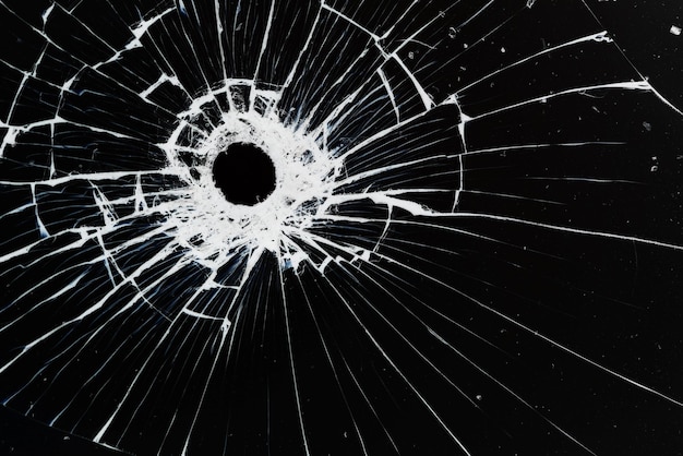 bullet hole on glass black background for overlay, transparent window