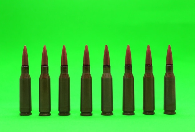 Bullets In Line On Green Screen Stock Photo