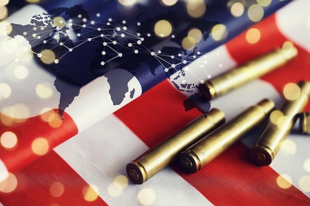 Bullets with an USA flag on a black wood background