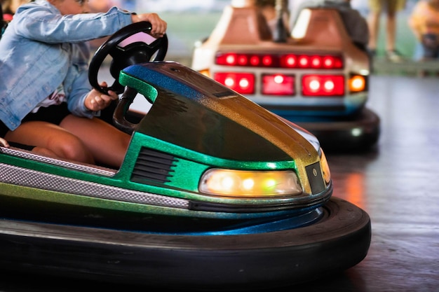 Bumper cars close up people having fun