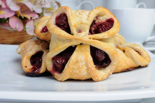 Bun puff pastry stuffed with cherries