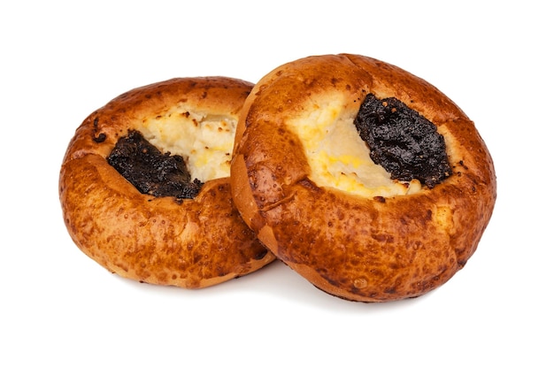 Bun with cheese and poppy seeds on white background