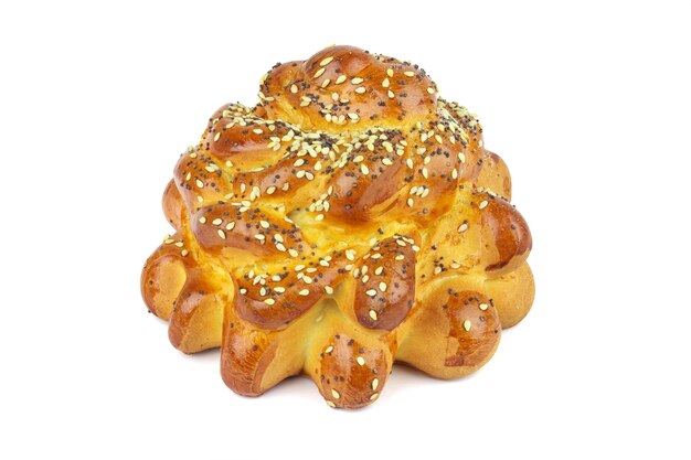 Bun with sesame seeds and poppy on white background