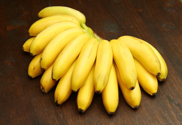 bunch of banana on wood