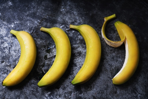 Bunch of Bananas on rustic table. Flat lay. Top View