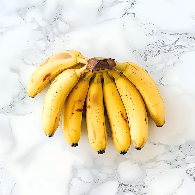a bunch of bananas that are on a marble surface