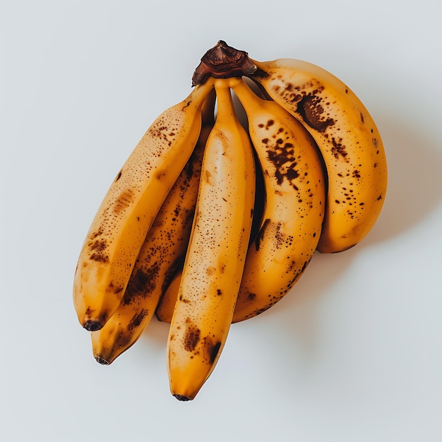 a bunch of bananas that have brown spots on them