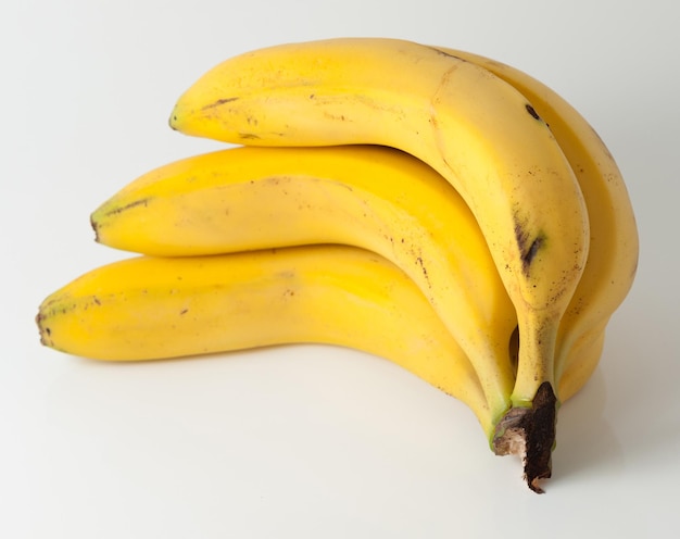 Bunch of bananas on a white background