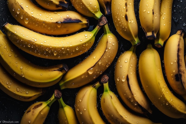 A bunch of bananas with water droplets on them