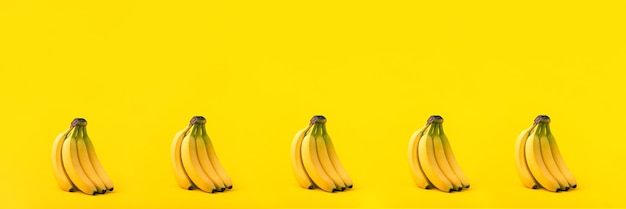 Bunch of bananas on yellow