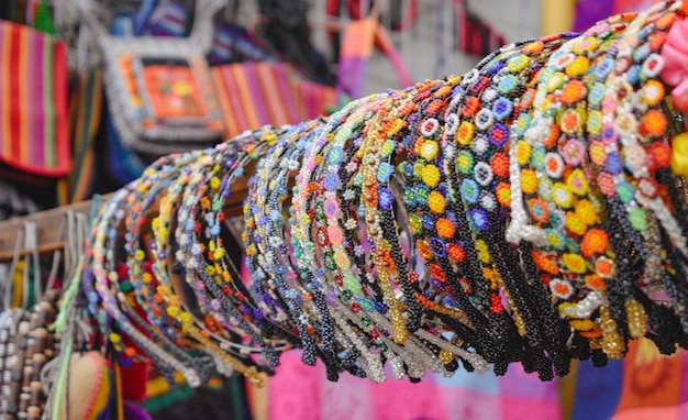 A bunch of bracelets are on display at a market