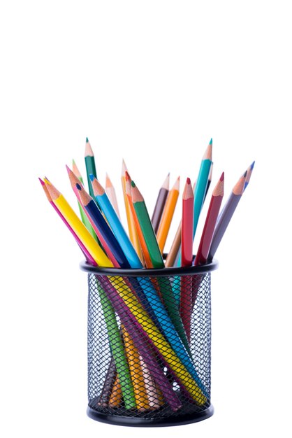 Bunch of color pencils in a stand over the white background