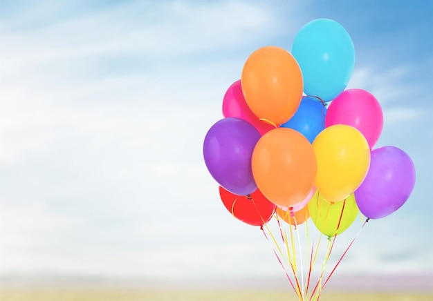 Bunch of colorful balloons on  background