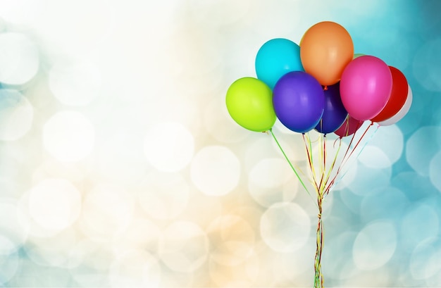 Bunch of colorful balloons on blue background