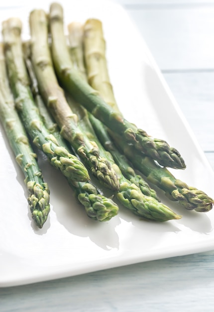 Bunch of cooked asparagus on the plate