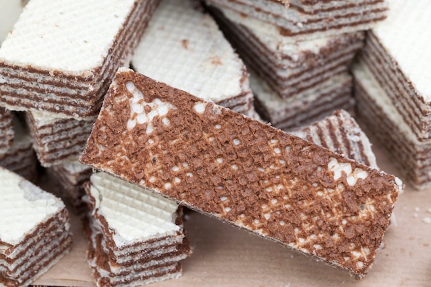 A bunch of crispy waffles made of wheat flour and chocolate filling, wheat waffles with chocolate filling