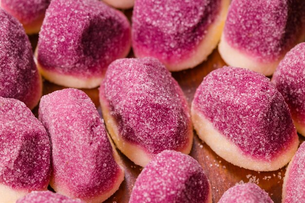 A bunch of curly multi-colored marmalade. sweet dessert