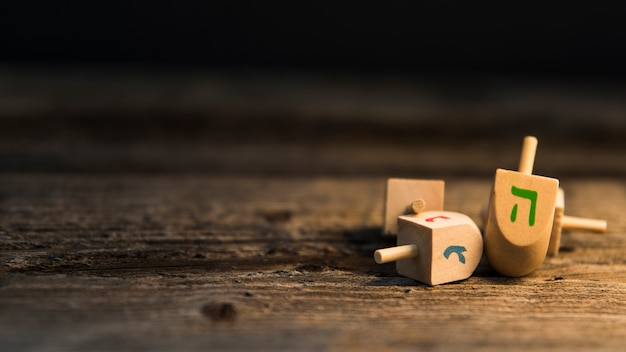 Photo bunch of dreidels on table