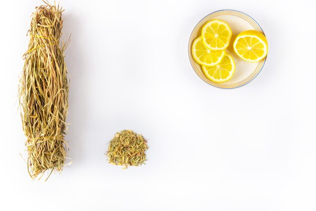 A bunch of dried lemongrass grass on a white background