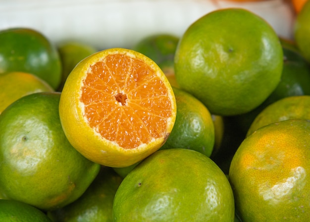 Bunch of fresh green oranges