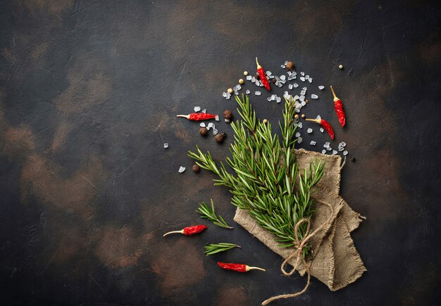 Bunch of fresh rosemary on dark background