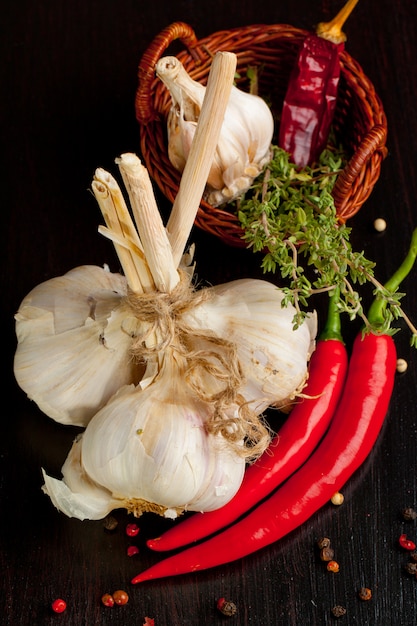 Bunch of garlic, chili pepper and thyme