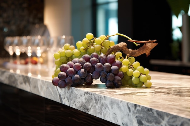 Photo a bunch of grapes are on a counter with a tree in the middle.