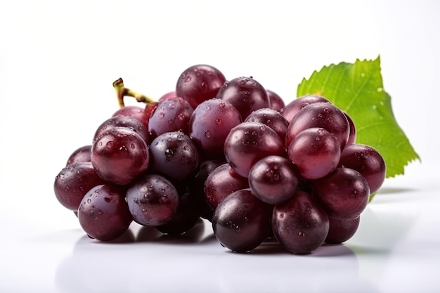 A bunch of grapes with green leaves on a white background