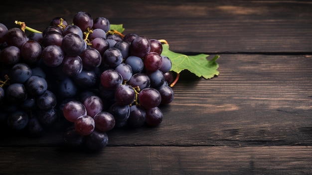 A bunch of grapes on a wooden table