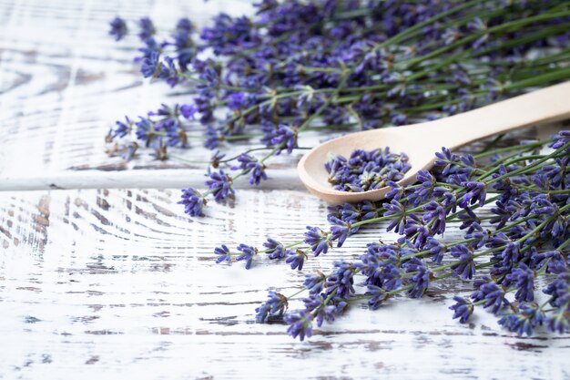 Bunch of lavender flowers on an old wood table 