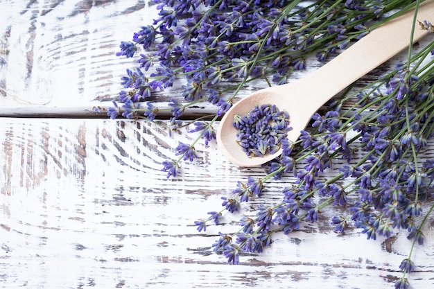 Bunch of lavender flowers on an old wood table 