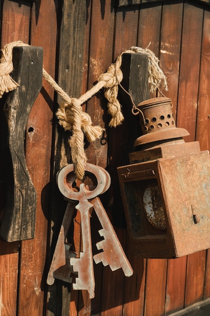 A bunch of old wooden keys hanging on a rope closeup