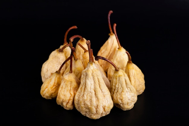A bunch of pears on a black background