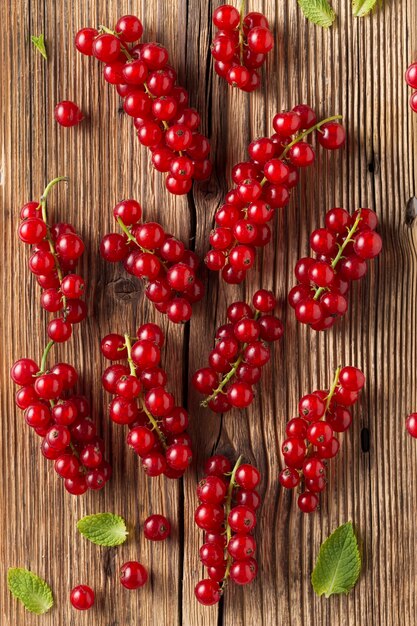 Bunch red currants on wooden